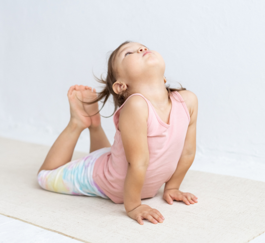 Toddler doing yoga